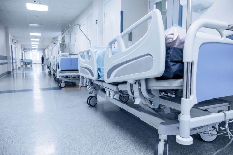 hospital beds in corridor shutterstock-414288607